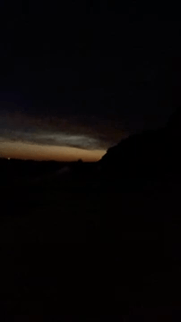 A video of a flashlight blinking 3 times in a short succession, then 3 times in a long succession, then back to three short ones again