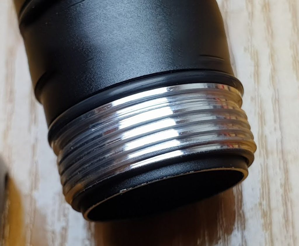 A zoomed in picture of a flashlight's threads. Proper maintenance of these threads will help keep your flashlight working longer.